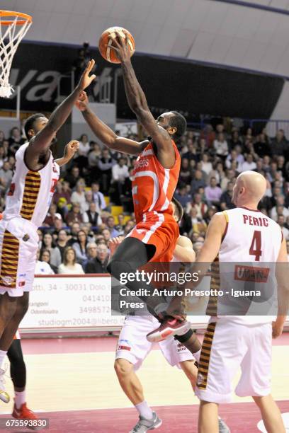 Christian Eyenga of Openjobmetis competes with Melvin Ejim and Jeff Viggiano and Hrvoje Peric of Umana during the LegaBasket of Serie A1 match...