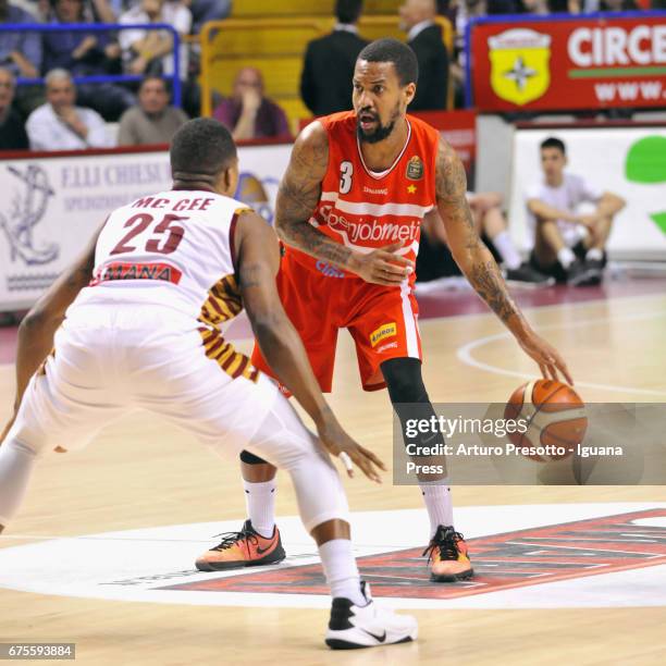 Eric Maynor of Openjobmetis competes with MarQuez Haynes of Umana during the LegaBasket of Serie A1 match between Reyer Umana Venezia and...