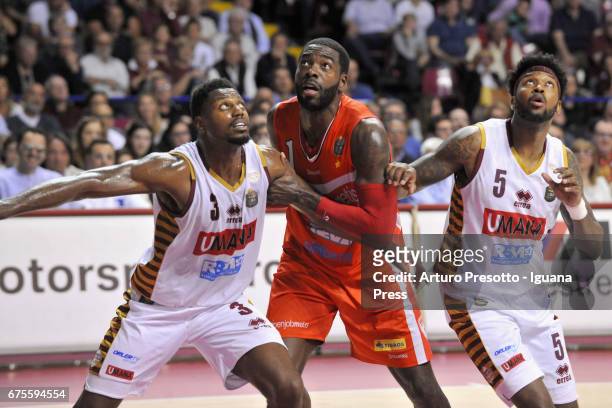 Anosike of Openjobmetis competes with Melvin Ejim and Julyan Stone of Umana during the LegaBasket of Serie A1 match between Reyer Umana Venezia and...