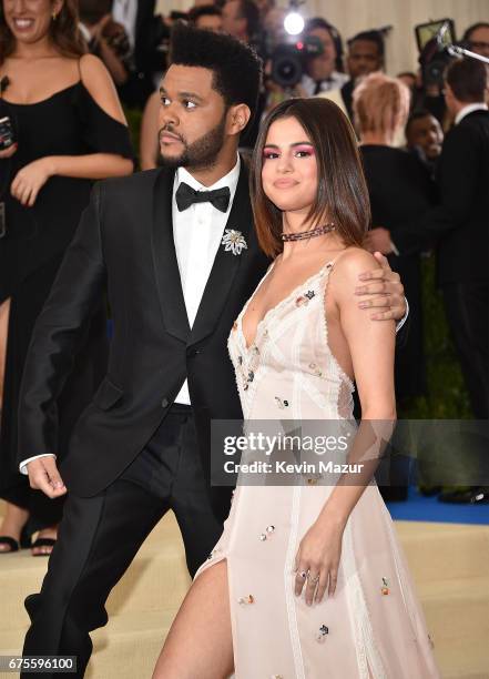 The Weeknd and Selena Gomez attend the "Rei Kawakubo/Comme des Garcons: Art Of The In-Between" Costume Institute Gala at Metropolitan Museum of Art...