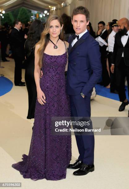 Hannah Bagshawe and Eddie Redmayne attend the "Rei Kawakubo/Comme des Garcons: Art Of The In-Between" Costume Institute Gala at Metropolitan Museum...