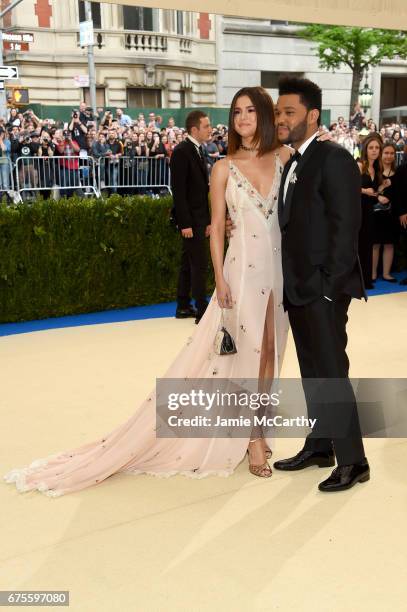 Selena Gomez and the Weeknd attend the "Rei Kawakubo/Comme des Garcons: Art Of The In-Between" Costume Institute Gala at Metropolitan Museum of Art...