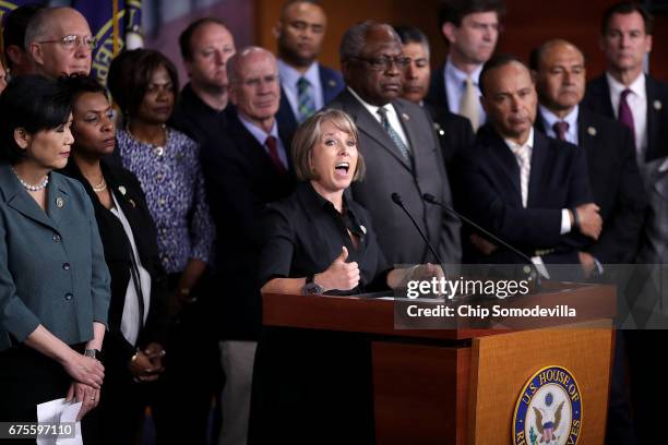 Congressional Hispanic Caucus Chair Rep. Michelle Lujan Grisham is joined by dozens of Democratic members of the House of Representatives to mark...