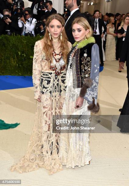 Mary-Kate and Ashley Olsen attend "Rei Kawakubo/Comme des Garcons: Art Of The In-Between" Costume Institute Gala at Metropolitan Museum of Art on May...