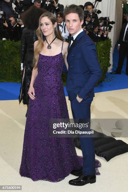 Hannah Bagshawe and Eddie Redmayne attend the "Rei Kawakubo/Comme des Garcons: Art Of The In-Between" Costume Institute Gala at Metropolitan Museum...