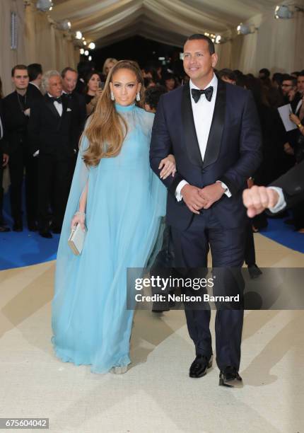 Jennifer Lopez and Alex Rodriguez attend the "Rei Kawakubo/Comme des Garcons: Art Of The In-Between" Costume Institute Gala at Metropolitan Museum of...