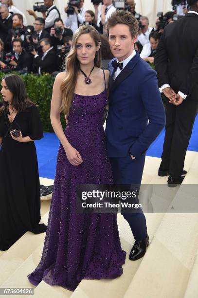 Hannah Bagshawe and Eddie Redmayne attend the "Rei Kawakubo/Comme des Garcons: Art Of The In-Between" Costume Institute Gala at Metropolitan Museum...