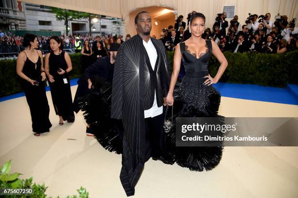 Sean 'Diddy' Combs aka Puff Daddy and Cassie attends the "Rei Kawakubo/Comme des Garcons: Art Of The In-Between" Costume Institute Gala at...