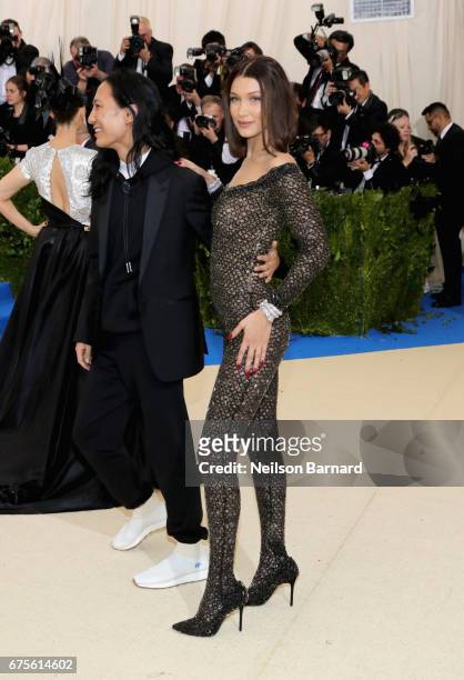 Alexander Wang and Bella Hadid attend the "Rei Kawakubo/Comme des Garcons: Art Of The In-Between" Costume Institute Gala at Metropolitan Museum of...