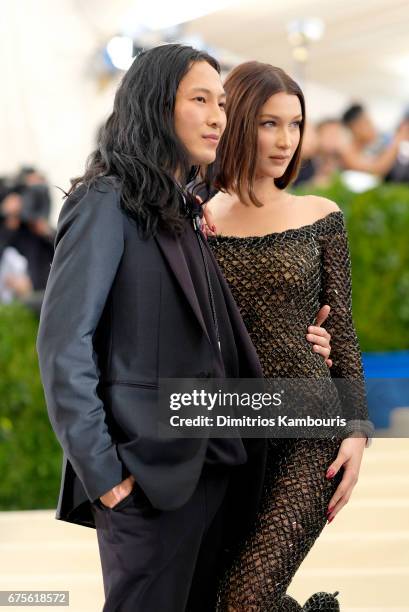 Alexander Wang and Bella Hadid attend the "Rei Kawakubo/Comme des Garcons: Art Of The In-Between" Costume Institute Gala at Metropolitan Museum of...