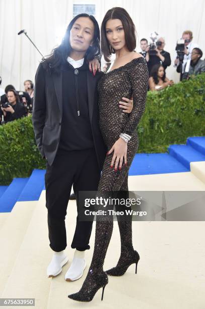 Alexander Wang and Bella Hadid attend the "Rei Kawakubo/Comme des Garcons: Art Of The In-Between" Costume Institute Gala at Metropolitan Museum of...