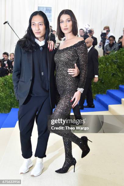 Alexander Wang and Bella Hadid attend the "Rei Kawakubo/Comme des Garcons: Art Of The In-Between" Costume Institute Gala at Metropolitan Museum of...