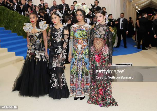 Lori Harvey, Natasha Lau, Corinne Foxx and Sonia Ben Ammar attend the "Rei Kawakubo/Comme des Garcons: Art Of The In-Between" Costume Institute Gala...