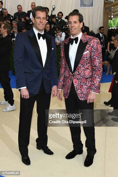 Cameron Winklevoss and Tyler Winklevoss attend the "Rei Kawakubo/Comme des Garcons: Art Of The In-Between" Costume Institute Gala at Metropolitan...