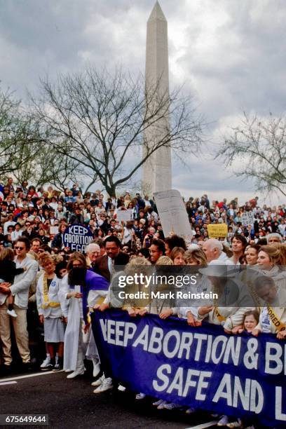 View of celebrity and civilian activists as they stand behind a 'Keep Abortion & Birth Control Safe and Legal' banner during the March for Women's...