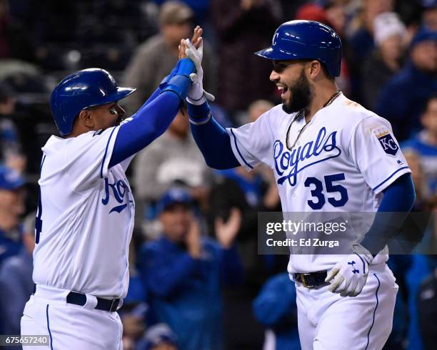 Eric Hosmer of the Kansas City Royals celebrates his two-run home run with Christian Colon in the seventh inning against the Chicago White Sox at...