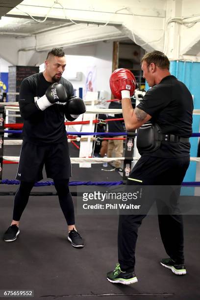 Joseph Parker spars with his trainer Kevin Barry during a training session on May 2, 2017 in Auckland, New Zealand. Parker will fight Razvan Cojanu...