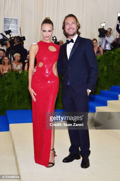 Natasha Poly and Lance Lepere arrive at "Rei Kawakubo/Comme des Garcons: Art Of The In-Between" Costume Institute Gala at The Metropolitan Museum on...