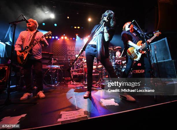 Musicians Mick Jones, Kelly Hansen and Jeff Pilson of Foreigner perform during Live Nation's celebration of The 3rd Annual National Concert Day at...