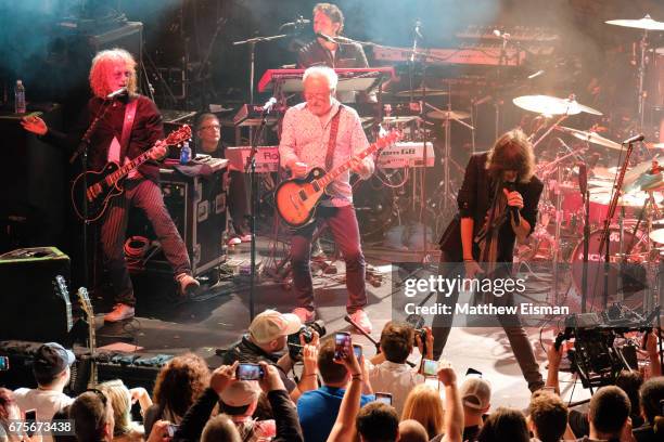 Musicians Bruce Watson, Mick Jones and Kelly Hansen of the band Foreigner perform live on stage during Live Nation's celebration of The 3rd Annual...