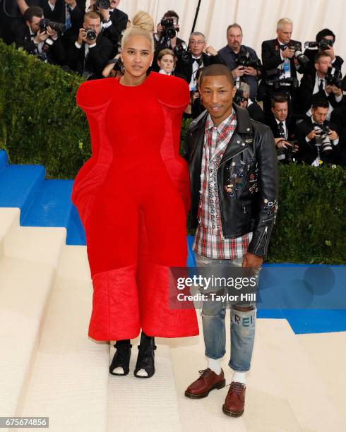 Pharrell Williams and Helen Lasichanh attends "Rei Kawakubo/Commes Des Garcons: Art of the In-Between" at Metropolitan Museum of Art on May 1, 2017...