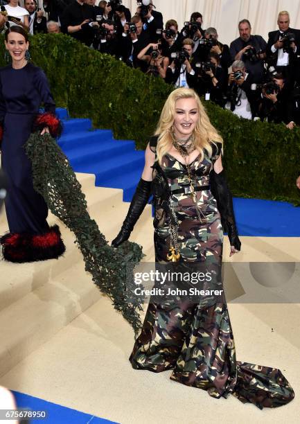 Actress Sarah Paulson and singer Madonna attend "Rei Kawakubo/Comme des Garcons: Art Of The In-Between" Costume Institute Gala at Metropolitan Museum...