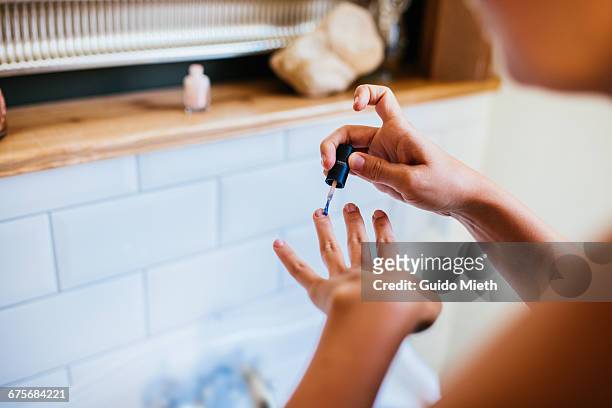 woman doing fingernails. - vernis à ongles photos et images de collection