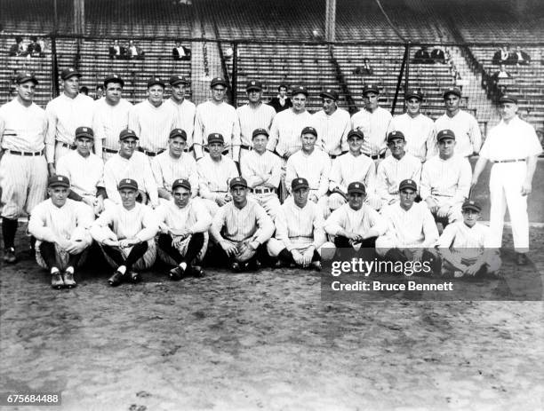 The 1927 New York Yankees pose for the team photo Walter "Dutch" Ruether, Joe Dugan, Ben Paschal, Benny Bengough, Myles Thomas, Mike Gazella, Ray...