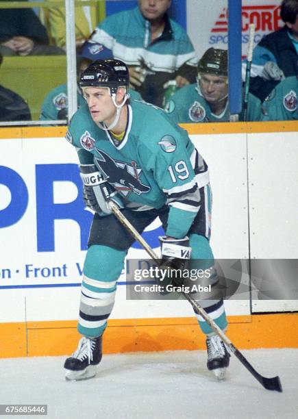 Doug Zmolek of the San Jose Sharks prepares for the face-off against the Toronto Maple Leafs on October 24, 1992 at Maple Leaf Gardens in Toronto,...