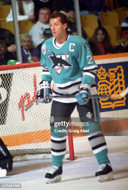 Doug Wilson of the San Jose Sharks watches the play develop against the Toronto Maple Leafs on October 24, 1992 at Maple Leaf Gardens in Toronto,...