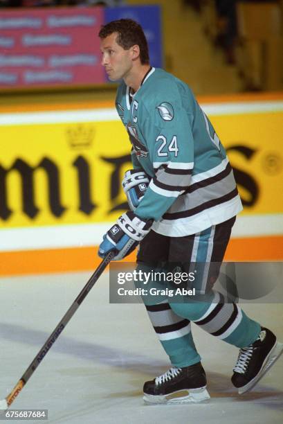 Doug wilson of the San Jose Sharks skates up ice against the Toronto Maple Leafs on October 24, 1992 at Maple Leaf Gardens in Toronto, Ontario,...