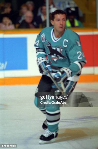 Doug Wilson of the San Jose Sharks turns up ice against the Toronto Maple Leafs on October 24, 1992 at Maple Leaf Gardens in Toronto, Ontario, Canada.