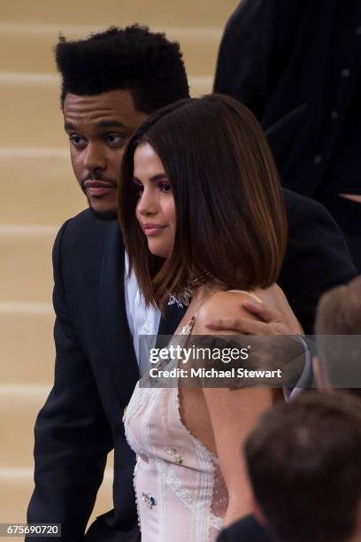 Singers The Weeknd and Selena Gomez attend the 'Rei Kawakubo/Comme des Garcons: Art Of The In-Between' Costume Institute Gala at Metropolitan Museum...