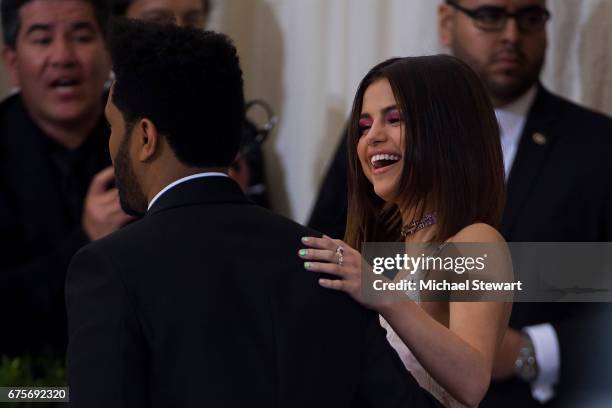 Singers The Weeknd and Selena Gomez attend the 'Rei Kawakubo/Comme des Garcons: Art Of The In-Between' Costume Institute Gala at Metropolitan Museum...