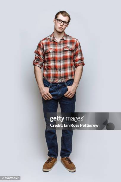 portrait of man with jeans & red check shirt - plaid shirt 個照片及圖片檔