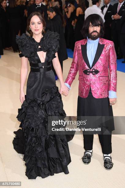 Dakota Johnson and Alessandro Michele attend "Rei Kawakubo/Comme des Garcons: Art Of The In-Between" Costume Institute Gala - Arrivals at...