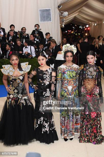 Lori Harvey, Natasha Lau, Corinne Foxx and Sonia Ben Ammar attend "Rei Kawakubo/Comme des Garcons: Art Of The In-Between" Costume Institute Gala -...