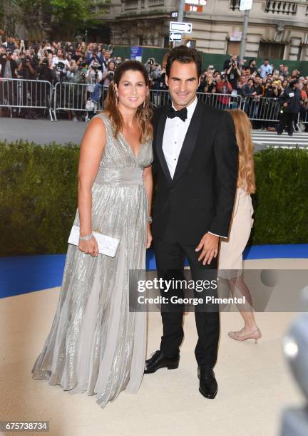 Mirka Federer and Roger Federer attend the 'Rei Kawakubo/Comme des Garcons: Art Of The In-Between' Costume Institute Gala at Metropolitan Museum of...