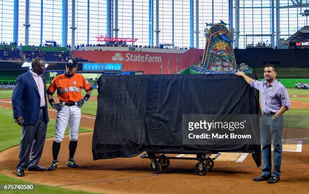 President of the Miami Marlins David P. Samson and President of Baseball Operations Michael Hill honor Ichiro Suzuki of the Miami Marlins for his...