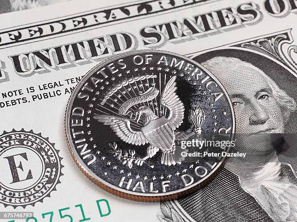 us half dollar coin - money-talks-englische-redewendung stock-fotos und bilder