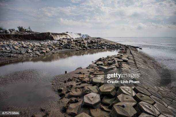 Part of the sea dike was destroyed by high tides on February 2017, photographed on April 29, 2017 in Bao Thuan Village, Ba Tri District, Ben Tre...