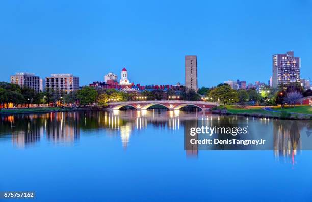 harvard university reflecting on the charles river - cambridge massachusetts imagens e fotografias de stock