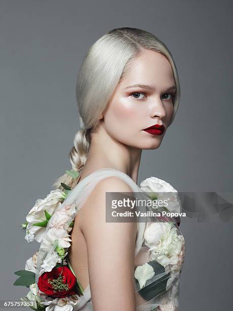 beautiful woman with flower dress - art modeling studio stock-fotos und bilder