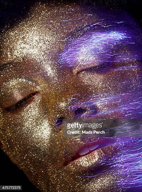 close up of girl with glitter makeup - coloursurgetrend stock-fotos und bilder