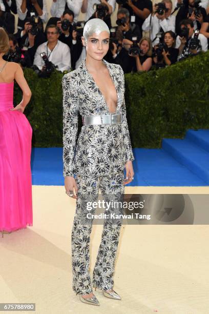 Cara Delevingne attends the "Rei Kawakubo/Comme des Garcons: Art Of The In-Between" Costume Institute Gala at the Metropolitan Museum of Art on May...