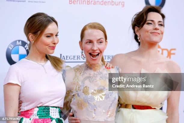 Mina Tander, Katharina Schuettler and Antje Traue attend the Lola - German Film Award red carpet at Messe Berlin on April 28, 2017 in Berlin, Germany.