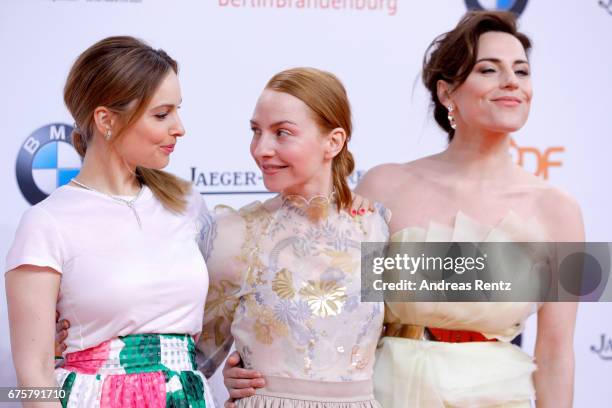 Mina Tander, Katharina Schuettler and Antje Traue attend the Lola - German Film Award red carpet at Messe Berlin on April 28, 2017 in Berlin, Germany.