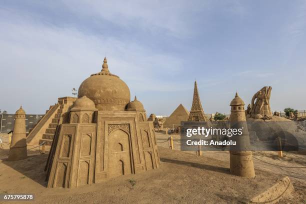 Taj Mahal and Eiffel Tover sand sculptures are exhibited during the 11th International Antalya Sand Sculpture Festival in Antalya, Turkey on May 02,...