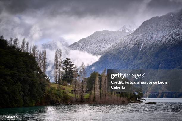 winter mood over the shores of lake todos los santos during de andean lake crossing - destinos turísticos bildbanksfoton och bilder