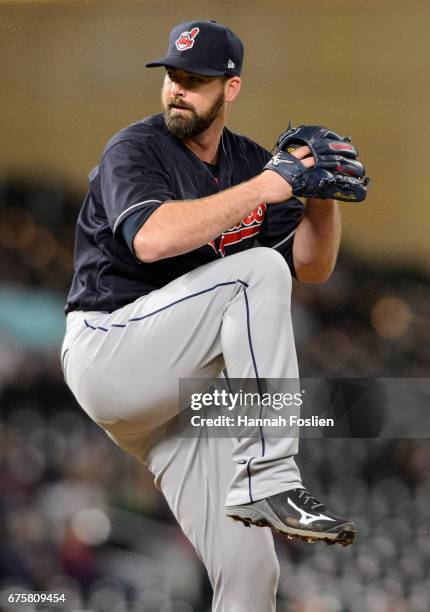 Boone Logan of the Cleveland Indians delivers a pitch against the Minnesota Twins during the game on April 18, 2017 at Target Field in Minneapolis,...